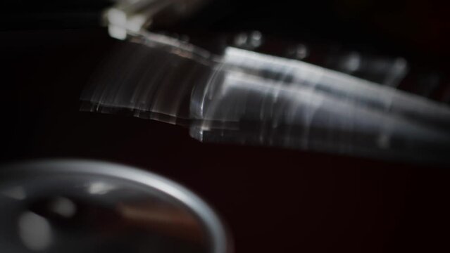 Computer hard drive without protective cover. Close up of hard disk with abstract reflection. Opened hard drive from the computer hdd with mirror effects Part of computer pc. Soft selective focus