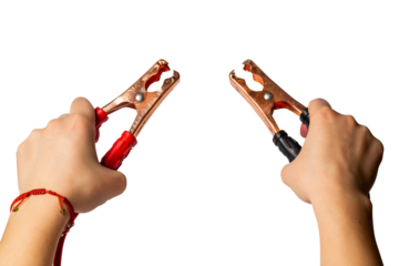 battery jumper cables in hands, isolated on transparent background