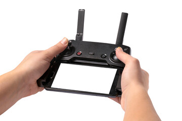 droning remote controller in hands, isolated on transparent background, with phone and place for text © alesmunt