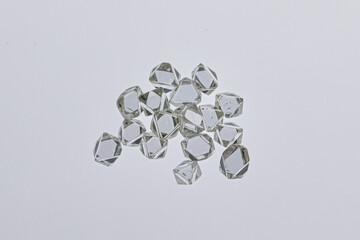 Natural rough diamonds in the sorting process close up. High quality photo