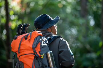 Obraz premium Young Man Traveler with backpack relaxing outdoor with rocky mountains on background Summer vacations and Lifestyle hiking concept.