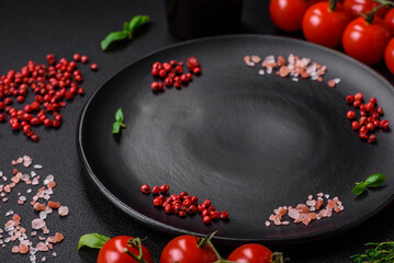 Ingredients for cooking cherry tomatoes, salt, spices and herbs