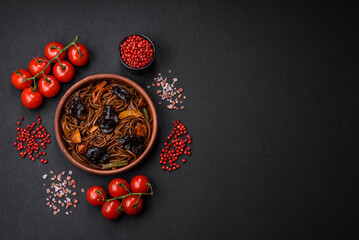 Delicious fresh buckwheat noodles or udon with mushrooms, peppers and other vegetables