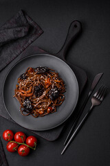 Delicious fresh buckwheat noodles or udon with mushrooms, peppers and other vegetables