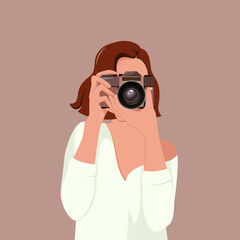 A beautiful girl with a camera. Clipart. Photographer.
