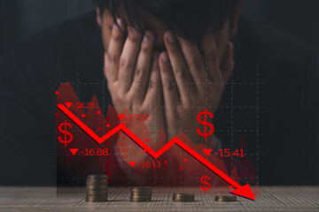 Stock market exchange loss trading graph analysis investment indicator business graph charts of financial board. Depressed businessman holding hands on bowed head, looking at declining graph.