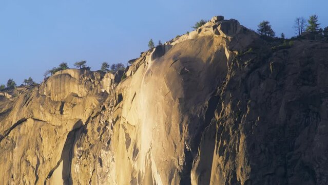 Scenic view of Yosemite Firefalls in Yosemite National Park, California, USA. Horsetail falls - rare event in winter season. Fire falls occurs on the east side of El Capitan rock formation, 4k footage