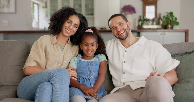 Happy, smile and face of family on sofa for relax, bonding and lounge together. Happiness, love and support with portrait of parents and child in living room at home for free time, care and hug