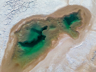 Aerial view of the famous tourist attraction Ojos del Mar near Tolar Grande in the Argentinian highlands called Puna in South America