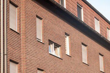 Facade of a new residential building withwindows