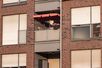 Facade of a residential building with balconies from the 1990s