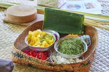 Making Canang sari(balinese offering) in Bali