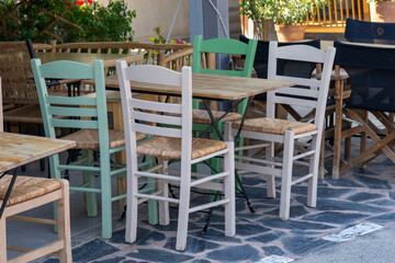 Fototapeta na wymiar chairs and tables in outdoor area of restaurant