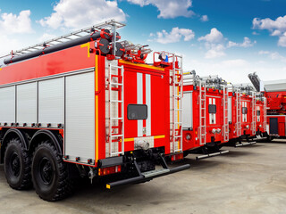 Fire service vehicles. Rescue truck parking. Machines firefighters. Red and white trucks to fight...
