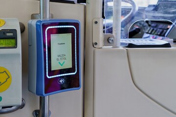 Barcelona, Spain-June 2, 2023. Bus contactless payment validator