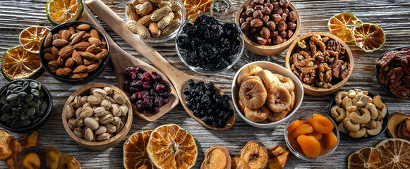 Composition with a variety of dried fruits and assorted nuts.