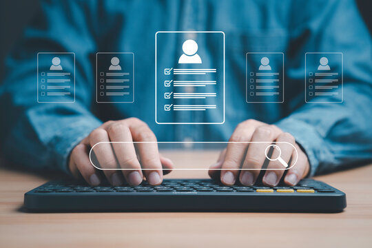 Headhunter using computer to check and select the optimum resume application form , Human development and recruitment to interview and join with company concept.