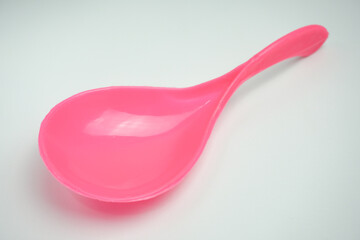 pink rice scoop. isolated on white background