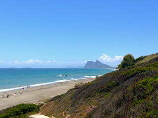 view along the beach near La Alcaidesa with a view towards the Rock of Gibraltar and Africa at the...