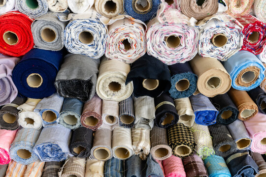 Colorful Fabrics In Warehouse. Rolls Of Fabrics For Sewing. Stock Photo,  Picture and Royalty Free Image. Image 121564787.