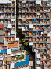 Fototapeta premium A Terraced apartment building and balconies from a drone view 