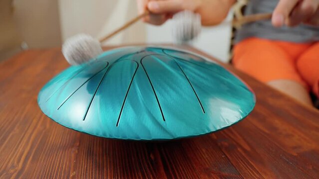 Glucophone instrument and sticks for playing music. Drum, modern musical instrument.