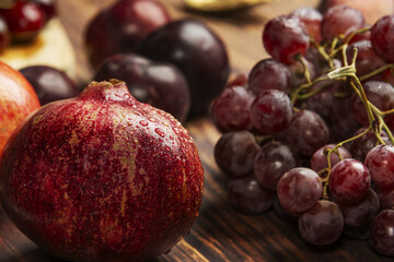 A ripe pomegranate with water drops