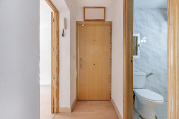 Hallway of a house with oak doors