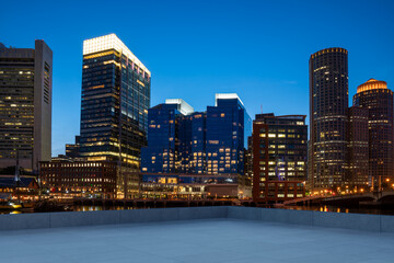 Naklejka premium Skyscrapers Cityscape Downtown, Boston Skyline Buildings. Beautiful Real Estate. Night time. Empty rooftop View. Success concept.