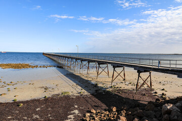 Fototapeta na wymiar View of Ceduna jetty against blue sky and ocean