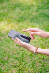 A female enjoying with smartphone