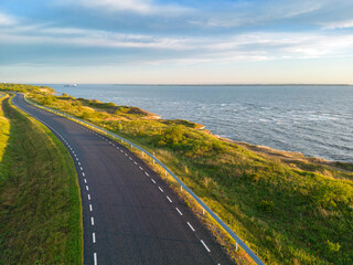 Road near the sea cliff on the Paldiski peninsula in summer day. 