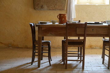Swiss Countryside Styled Brown Table and Chairs with Contemporary Archaeological Influence