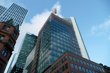 Business centers and banks in skyscrapers of a modern metropolis against the blue sky, copy space