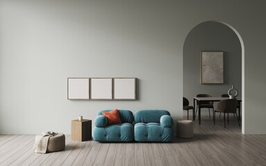 Living room with a fashionable blue sofa, in the background is the entrance through the archway to the dining area. In the back dining area with table and chairs. Empty frame on the wall. 3d rendering