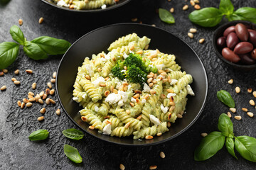 Creamy broccoli feta cheese pasta with pine nuts. Healthy food