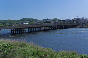 Fototapeta na wymiar Uji River and Tachibana Bridge, Uji City, Kyoto Prefecture.