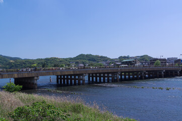 Fototapeta na wymiar Uji River and Tachibana Bridge, Uji City, Kyoto Prefecture.