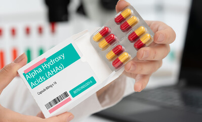 Alpha Hydroxy Acids (AHAs) used in beauty industry and cosmetics in capsule