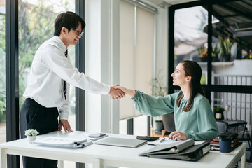 Business teamwork colleague concept, Business colleague shaking hands together after work successful about collaboration to brainstorming and discussing about strategy of new startup