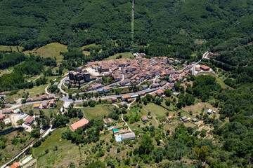Aerial  images of Montemayor del Río in the province of Salamanca during a sunny summer day