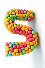 illustration of colorful letter S made from bright pills on white background