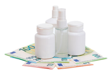 Different Bottles with Pills, Capsules and Medicines on the Euro Banknotes - Isolated on White. Global Pharmaceutical Industry and Big Pharma. Euro Money Bills - Isolation