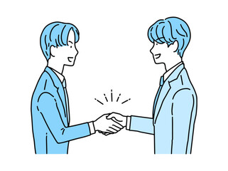 取引先と商談のため握手をするビジネスマン