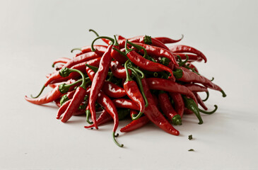 Bunche of fresh chilli peppers isolated on a white background