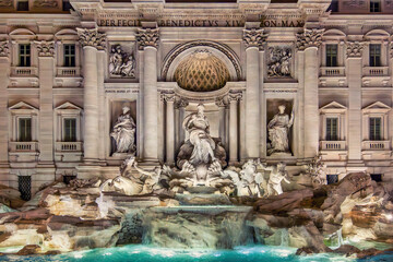 Fototapeta premium Trevi fountain: 18th-century fountain in the Trevi district in Rome, Italy, designed by Italian architect Nicola Salvi and completed by Giuseppe Pannini.