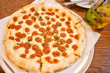 The pizza Bolognese is made with excellent chunky pasta sauce with beef, pork, lots of vegetables and tons of flavor.