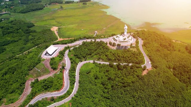 Aerial view of Our lady of Lourdes Virgin Mary catholic religious statue on a Nui Cui mountain in Dong Nai province, Vietnam.