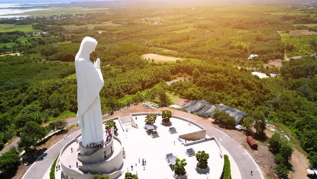 Aerial view of Our lady of Lourdes Virgin Mary catholic religious statue on a Nui Cui mountain in Dong Nai province, Vietnam.