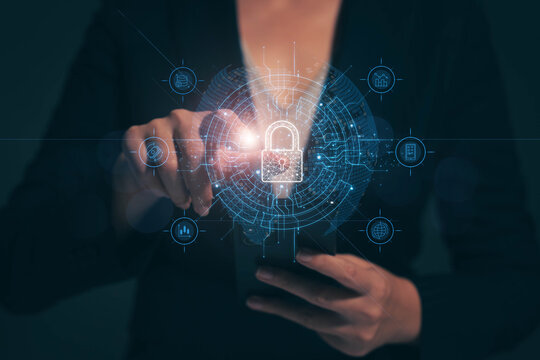 Cyber ​​Security and Protection of Critical Data Businesswoman holding a padlock, internet network security Protect your business and financial transaction data from cyber attacks
